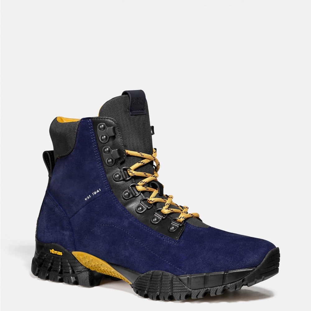 COPY - Suede, leather and CORDURA® upper
Nylon lining, leather footbed
Rubber o…